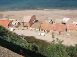 Maisons de la Marine
----
� gauche le toit : maison TOUALBIA
puis la maison � �tage TORRES et CIXOUS
qui d�passe de la route
maison PAYA
maison WERRY
maison PEREZ 