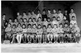 Classe CM-2 
1961-62
----
la photo est un peu ab�m�e
elle a surv�cu au tremblement 
de terre de 2003 � Boumerdes
----
Khaled CHEKIRI est assis tenant l'ardoise
Ahmed DERAMCHIA est debout juste derriere lui 